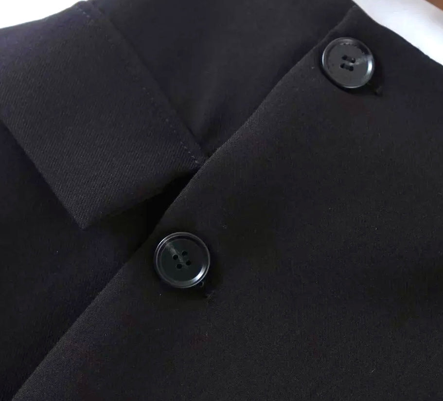 Black button front mini skirt
